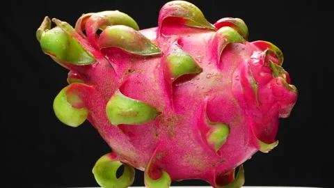 Rotating Ripe Dragon Fruit (Pitaya) Isolated on Black Background Studio Shot 4K Stock Footage 320625302