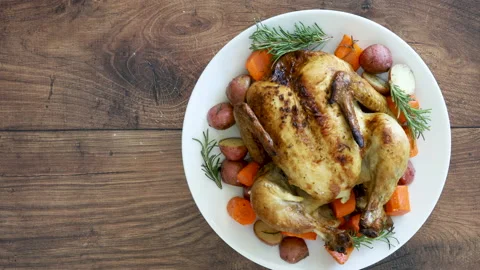 Rotating Roasted Chicken and Root Vegetables Stock Footage 162200558
