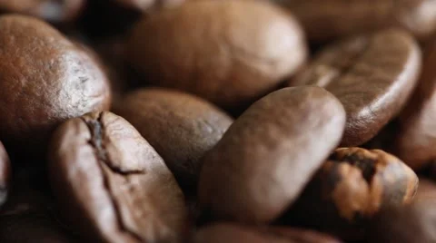 Rotating roasted coffee beans background concept interesting Stock Footage 68376565