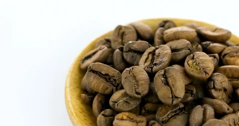 Rotating Roasted Coffee Beans Isolated on White Background Stock Footage 102813704
