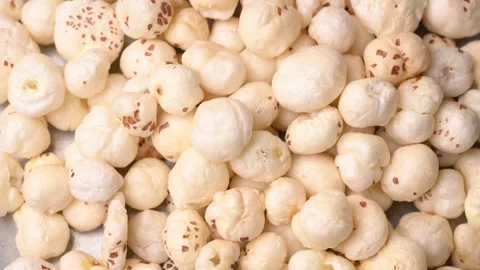 Rotating Roasted Makhana Top View Healthy Fox Nuts Macro 4K Video Stock Footage 340753793