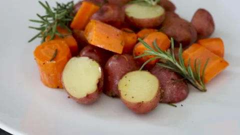 Rotating Roasted Root Vegetables Stock Footage 162200501