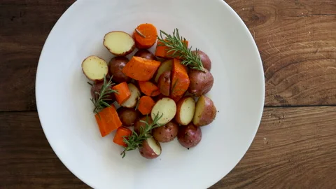 Rotating Roasted Root Vegetables Stock Footage 162200647