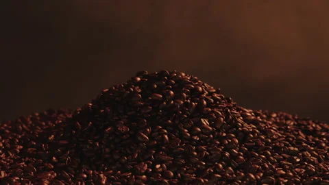 Rotating roating coffee beans with roast smoke Stock Footage 145274329