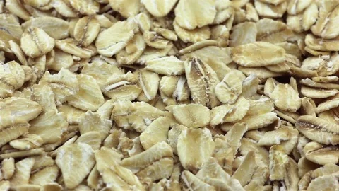 Rotating rolled oats flakes closeup Stock Footage 69821819