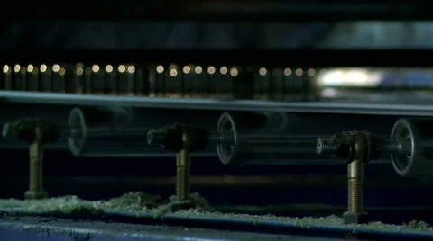 Rotating rollers on gluing machine, close-up Stock Footage 57326972