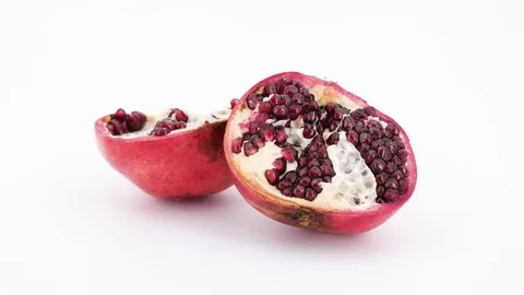 Rotating romegranate fruit isolated on white background. Stock Footage 83667114
