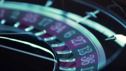 Rotating roulette in casino with dark background Stock Footage 129338952