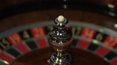 Rotating roulette in casino with dark background Stock Footage 129851654