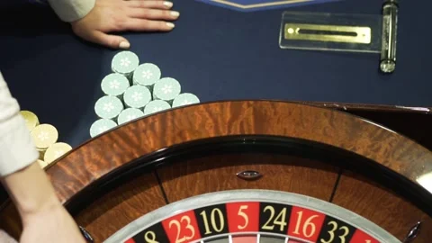 Rotating roulette in casino with dark background Stock Footage 130244176