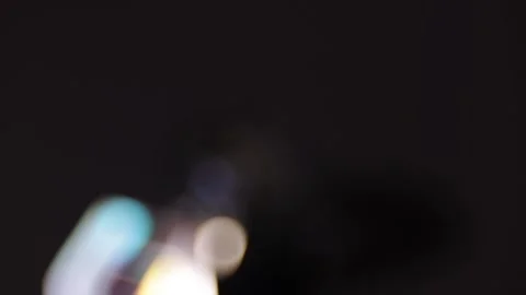 Rotating round and polygonal bokeh lights on a black background for digital.. 스톡 동영상 341736889