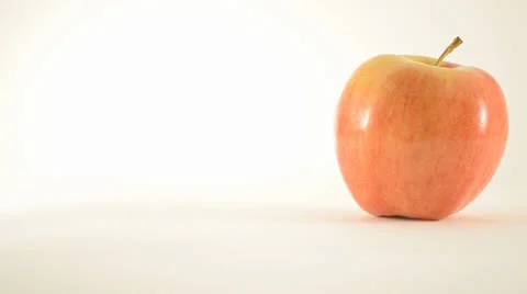 Rotating Royal Gala Apple Against White - Dolly Left Stock Footage 24471257