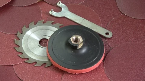 Rotating sanding discs and circular saw tool Stock Footage 95269809