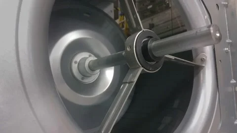 Rotating scroll fan shaft on an industrial air con ventilation unit Stock Footage 172552518