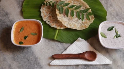 rotating Set Dosa is a 'set' of 2 dosas... | Stock Video | Pond5