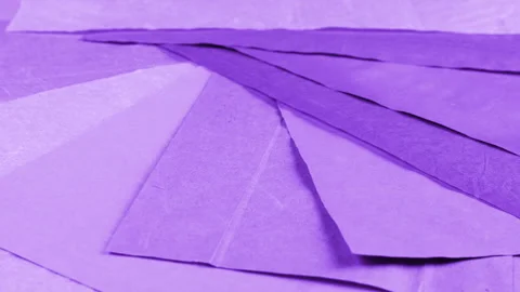 Rotating sheets of handmade paper in various shades of purple. Stock-Footage 330244908
