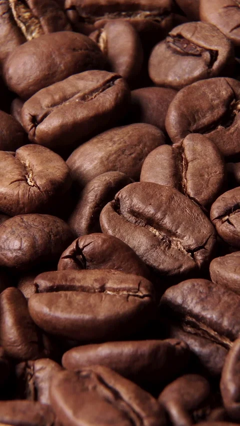 Rotating shot of delicious roasted coffee beans Stock Footage 257097704