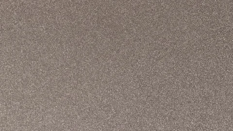 Rotating Silver Background with a Glitter Pattern Texture of a 4K Video Stock Stock Footage 323860758