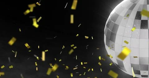 Rotating silver mirrored disco ball reflecting light in dark studio, with gold イラスト素材