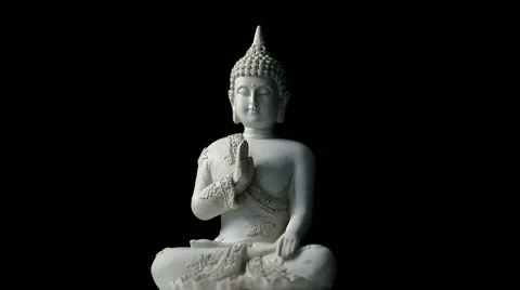 Rotating sitting Buddha statue, against isolated black background (loop) Stock Footage 65513053