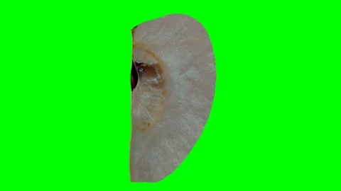Rotating slice of apple - green screen Stock Footage 85580440