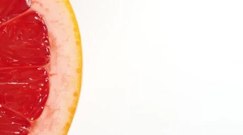 Rotating slice of grapefruit Stock Footage 68818342