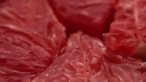 Rotating sliced fresh red grapefruit Stock Footage 134244142