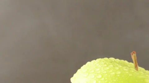 Rotating Sliced Green Apple - Crane Down Video stock 22024329