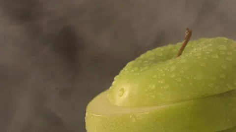 Rotating Sliced Green Apple Video stock 22024281