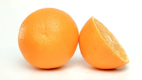 Rotating sliced orange on a white background Video stock 112753772