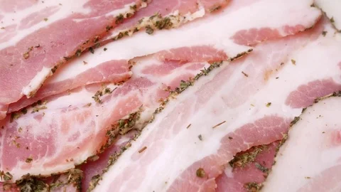 Rotating slices of bacon. Stock Footage 70877419