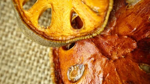 Rotating slices of dry bael fruit, close-up, 4K Stock-Footage 89190842