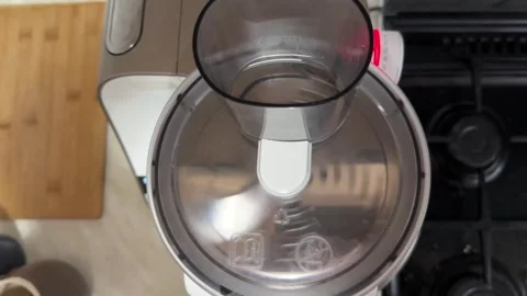Rotating slicing disc blade inside food processor, vegetable cutting mechanism Stock Footage 337117814