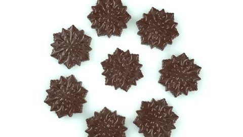 Rotating Snowflakes Made of Chocolate. Stock-Footage 259900834