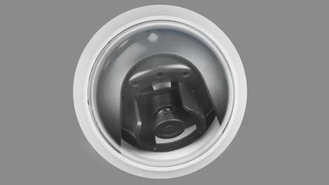 Rotating spherical security camera under transparent protective cover Video stock 133643810