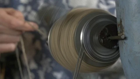 Rotating spindle in a manual woolen lock during operation. Stock Footage 119499035