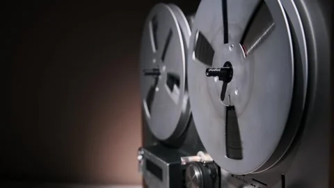 Rotating Spools of Analog Tape Machine Stock Footage 296152629