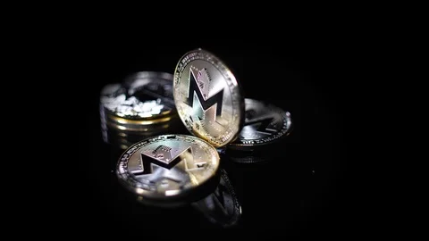 Rotating stack of Monero cryptocoins Stock Footage 124908536