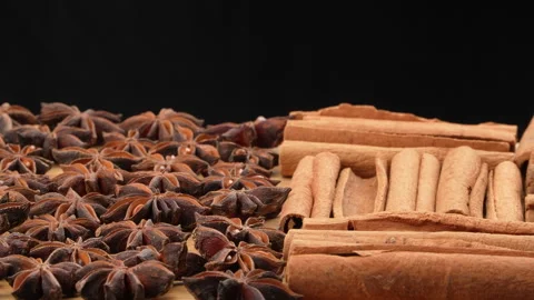 Rotating Star Anise And Cinnamon Spices On Black Background Видео 331375855