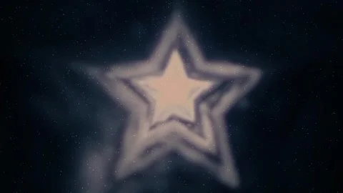 A rotating star is formed from bright light passing through a smoky space Stock Footage 330887163