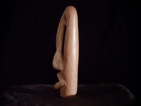 Rotating statuette of an abstract human head Stock Footage 69377604