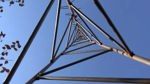 Rotating of Steel Triangle Tower for Wind Turbine.  Look from the bottom. 4K Ult Vídeos de archivo 60239757