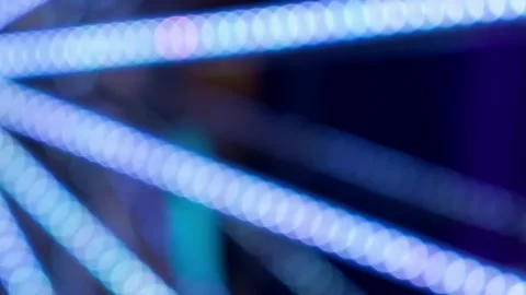 Rotating stripes with blurred lights 스톡 동영상 297395428