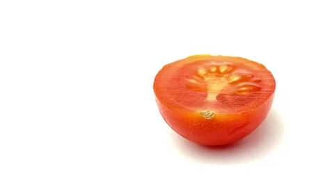 Rotating studio video of succulent half sliced cherry tomato Stock Footage 83191055