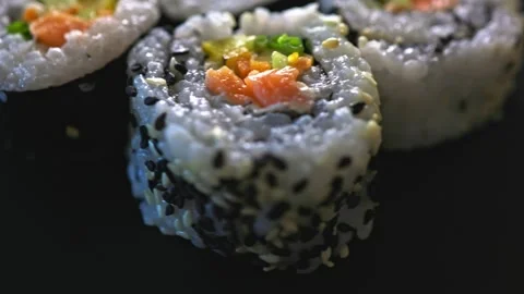 Rotating sushi rolls, close-up. Stock Footage 337452015