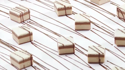 Rotating sweets with chocolate drizzle Stock Footage 8571168