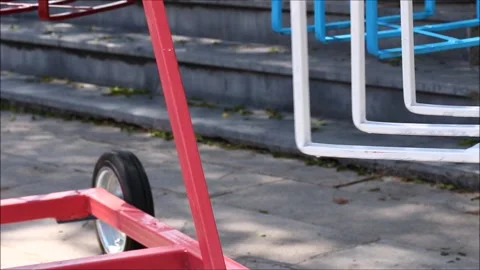 Rotating swing for children in the park Video stock 155587558