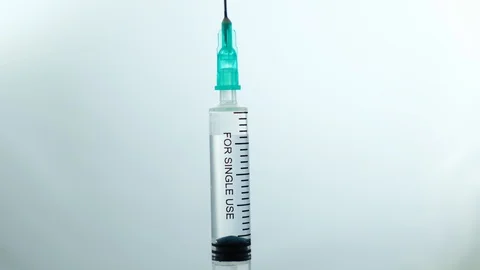 Rotating Syringe on White Background Clo... | Stock Video | Pond5