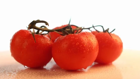 Rotating table and branch of tomatoes. Concept of eating, cooking and design. Stock Footage 124132964