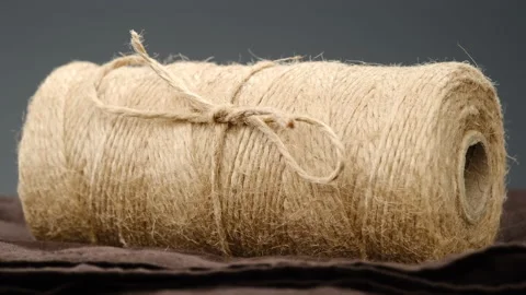 On rotating table is flax hemp rope closeup. jute. 스톡 동영상 130597828